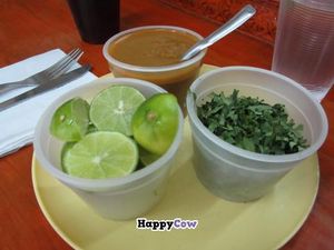 lime wedges, salsa at Vege Taco in Mexico City