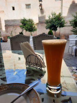 Orange juice (25 dirhams) and a view on the yard. at Dar Tajine in Fes