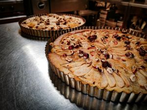 Pear and hazelnut tart out of the oven, gluten-free at Toutes Les Couleurs in Lyon
