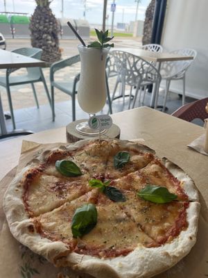 Vegan Margherita Pizza and Pina Colada   at Soma Bistro in La Pineda