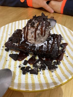Brownie is hot, and gooey. Ice cream is perfect with it!   at Vegan Queen in Murcia