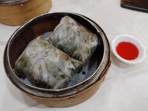 Glutinous Rice In Lotus Leaf With Purple Rice And Mushrooms. at Three Virtues 三德食品 - Jordan in Kowloon