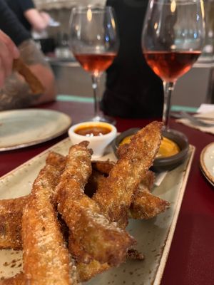 Breaded seitan sticks with chipotle sauce and homemade ketchup. at Biocenter - Pintor Fortuny in Barcelona