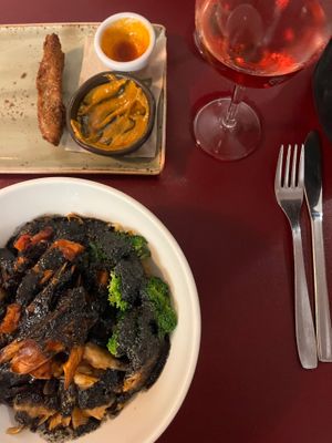 Breaded seitan sticks with chipotle sauce and homemade ketchup for starters, and heura bowl as main. Nice rosé wine on the side. at Biocenter - Pintor Fortuny in Barcelona