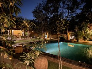 Poolside in the evening  at Koththamalli by Rohan in Negombo