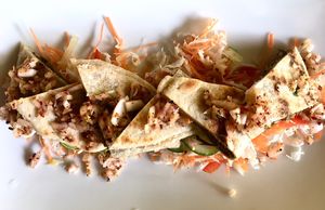 Coconut rotti stuffed with tempered banana blossoms. A bit dry and bland, but beautiful presentation. at Koththamalli by Rohan in Negombo