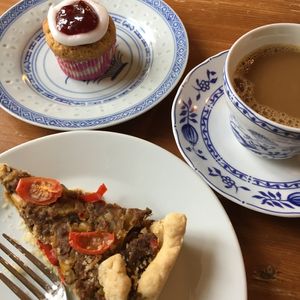 Coffee break with spicy pulled broad beans pie and Runeberg torta. at Kahvila Lähde in Helsinki