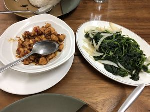 Chili soya tofu and garlic spinach ($2.5 each) at Sumatra Restaurant in Phnom Penh