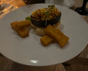 Grilled fish and roasted cauliflower with polenta fries  at Ike's Bistro in Oranjestad