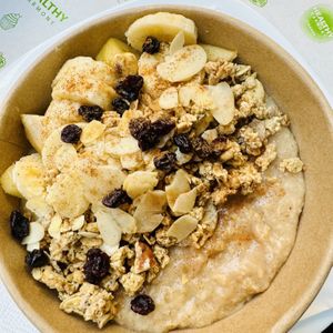 Porridge with banana and applee  at Healthy Harmony Piraeus in Piraeus