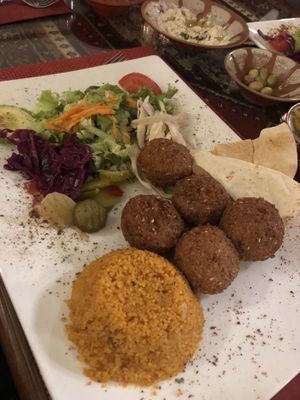 Falafel plate with salad and couscous (instead of yoghurt sauce you get an extra bowl with tahini sauce) at Cedar's in Loerrach