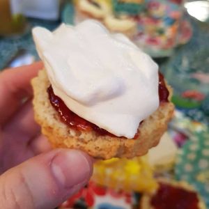 Scone with cream and jam at  Compassion Cakes in Whitstable