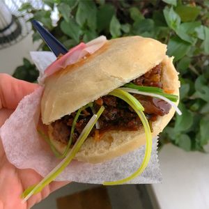 Steamed vegan bun with pulled oats jerky. at Kamalig in Helsinki