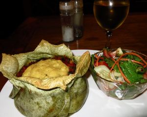 Veg lasagna made with soya milk on request and one days notice. Served with crushed macadamia nuts on top. at Casa Rossa in Zomba