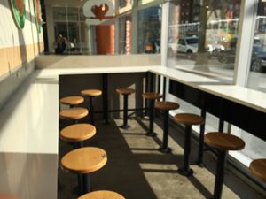 Stools to sit and eat (there are also tables and chairs nearby) at Next Level Burger - Brooklyn in Brooklyn