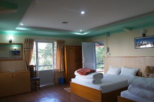 Family Room with balcony . at Mountain Paradise Hotel in Nagarkot