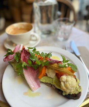 Really nice staff and I enjoyed the vegan avocado toast with oatlatte.   at Saint Pearl in Paris