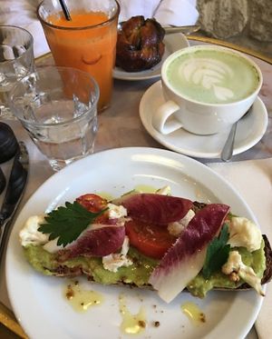 Vegan avo toast (expensive and disappointing) and oat matcha latte at Saint Pearl in Paris