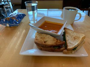 Vegan garden burger + vegan creamy tomato soup =   at 918 Coffee in Tulsa