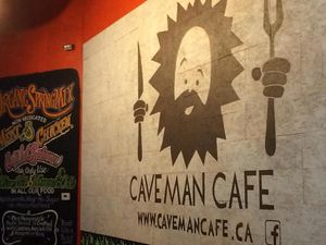 At the entrance at Caveman Cafe in Vancouver