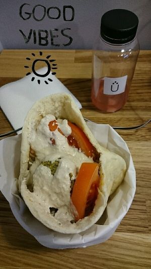 tahini falafel and watermelon juice   at Kuzen Falafel in Kyiv