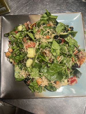 Spinach Salad with vegan noodles dressed with ginger and lime.   at Fresh From The Farm Juices in Canonsburg