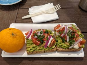 Triple threat with avocado, black bean hummus, and vegan ricotta. at Copeka Coffee in Grand Junction