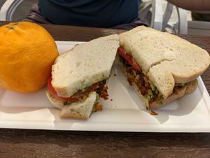 BAT with coconut bacon (yum!), Avocado, and tomato on homemade bread. at Copeka Coffee in Grand Junction