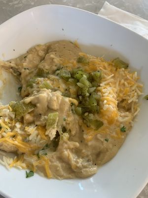 Biscuits and gravy with green chiles and cheese (vegan cheese is an option too)  at Copeka Coffee in Grand Junction