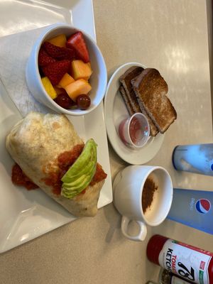 vegan burrito with fresh fruit, organic wheat toast & vegan chai latte with almond milk since they didn’t have oat milk.   at Noble Restaurant in Wyoming