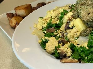 Vegan Scramble: Tofu & Vegan Egg Spice add Kale, Pineapple, Mushrooms, Onions, Vegan Basil Pesto w/ Red Skin Potatoes at Noble Restaurant in Wyoming