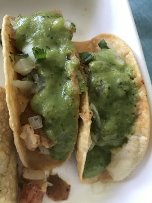 Crispy potato tacos with hot green salsa at Hugo's Restaurant - Studio City in Studio City