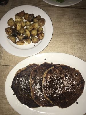 Life changing chocolate chip pancakes and roasted potatoes at Hugo's Restaurant - Studio City in Studio City
