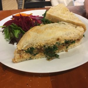 Spicy tempeh sandwich—-UNREAL. The cashew pepper jack was... phenomenal. Must try.  at Knead Bakery in Burlington