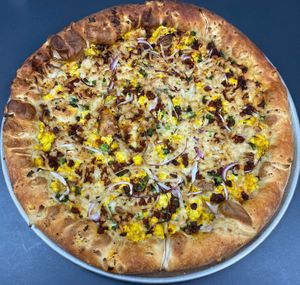 Vegan Baja

Creamy bac'un white sauce, scrambled tofu, soyrizo, red onions, & green onions, at Buffalo Pizza and Ice Cream in Sacramento