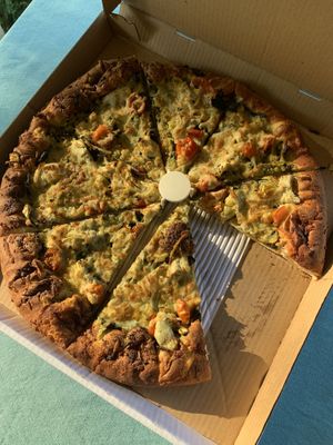 Vegan pesto…pesto sauce, vegan cheese, tomatoes, artichoke hearts….it’s so damn good!  at Buffalo Pizza and Ice Cream in Sacramento