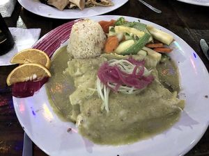 Zucchini enchiladas in zucchini sauce with a side of zucchini at El Zarape Malecón  in La Paz