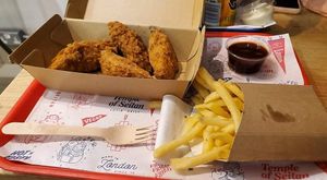 Vegan wings, fries, bbq sauce at Temple of Seitan - Camden in North West London