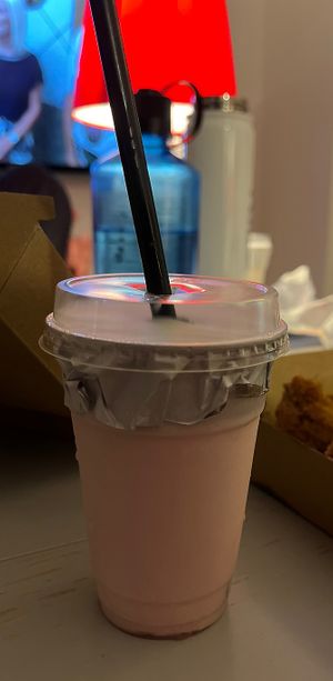 strawberry milkshake (via uber eats)  at Temple of Seitan - Camden in North West London