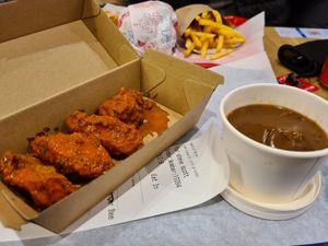 Chicken wings with gravy at Temple of Seitan - Camden in North West London