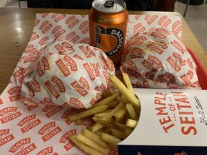 Our burgers - the patties were grand!!!  at Temple of Seitan - Camden in North West London