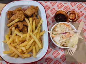 Popcorn snack pack, coleslaw with BBQ sauce at Temple of Seitan - Camden in North West London