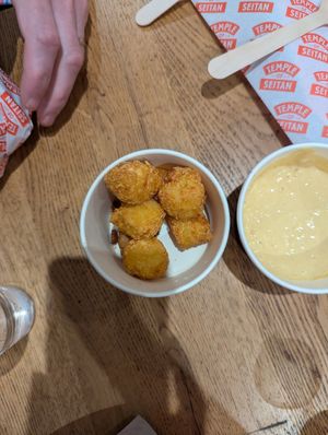 Tots with cheese sauce at Temple of Seitan - Camden in North West London