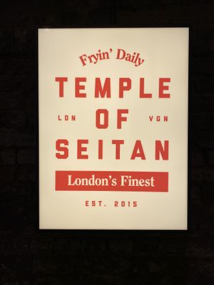 Sign   at Temple of Seitan - Camden in North West London