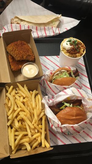 Temple burger + temple deluxe + twist wrap + two piece hot + Mac and cheese + fries at Temple of Seitan - Camden in North West London