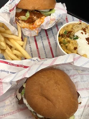 Buffalo sandwich, fries, mac and cheese and classic fried chicken sandwich at Temple of Seitan - Camden in North West London