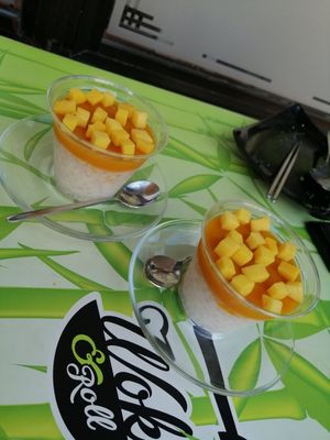 Coconut mango desert with tapioca pearls-vegan and also gluten free. Very good! at Wok & Roll in Celje