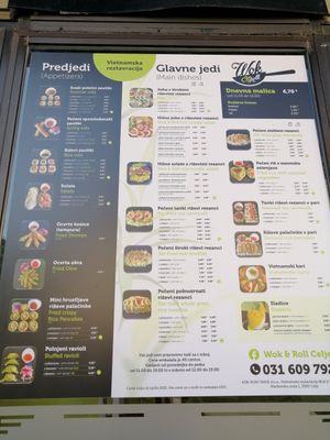 Menu, vegan dishes marked with green V dot on the right at Wok & Roll in Celje