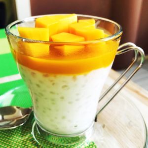 Gluten free + vegan dessert made from tapioca, coconut milk and fresh mango!  at Wok & Roll in Celje