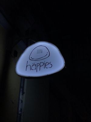 outside logo at häppies in Berlin